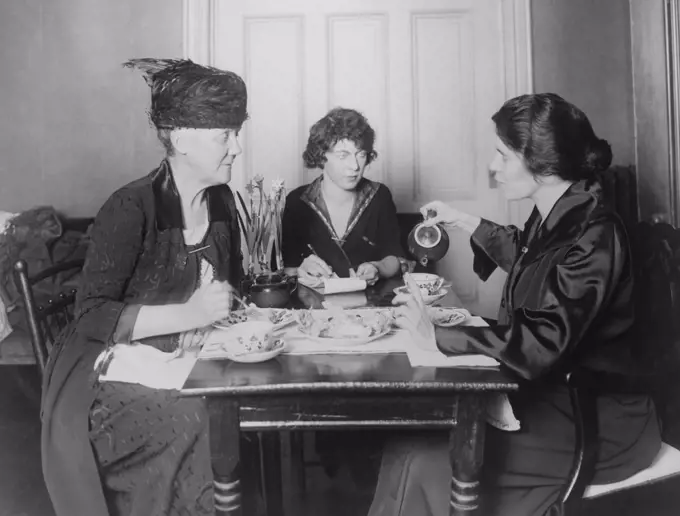 Three feminists activists in conference. Left to right: Dora Lewis Lawrence, activists and philanthropists; Pauline Floyd,(later the youngest lawyer admitted to practice before the supreme court) and Alice Paul. Ca. 1910-1920.
