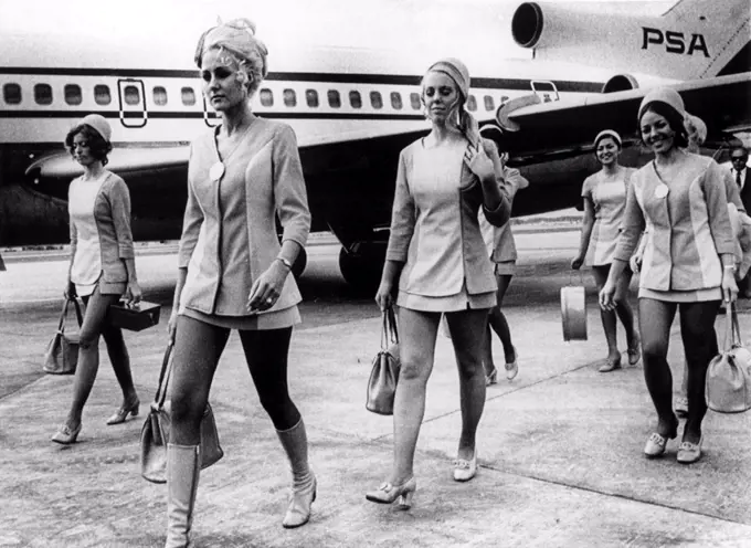 January 8, 1972-- Miami, FLA-- Stewardesses who were aboard the Pacific Northwest Airlines Boeing 727 which was hijacked on a flight from San Francisco to Los Angeles January 8, and forced to fly to Cuba after a fuel stop in Tampa, are shown as they leave the plane as they arrived in Miami January 7.