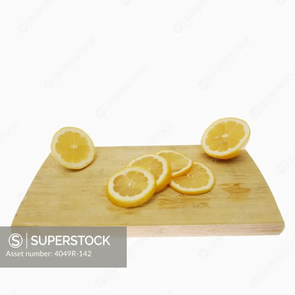 Close-up of lemon slices on a cutting board