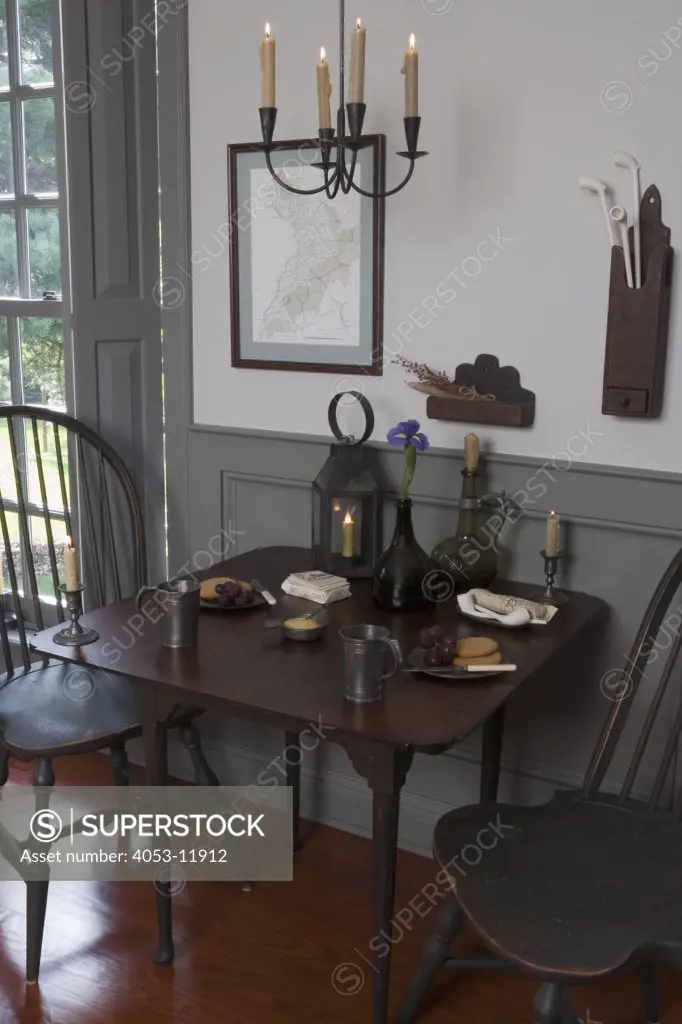 EATING AREAS: period style, game table, colonial, gray dado and trim, candle chandelier