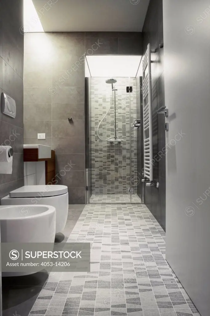 Monochrome bathroom with shower. Altamura, Italy. 08/27/2010