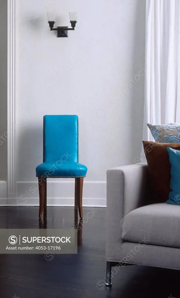 Blue chair in living room, Argentina.