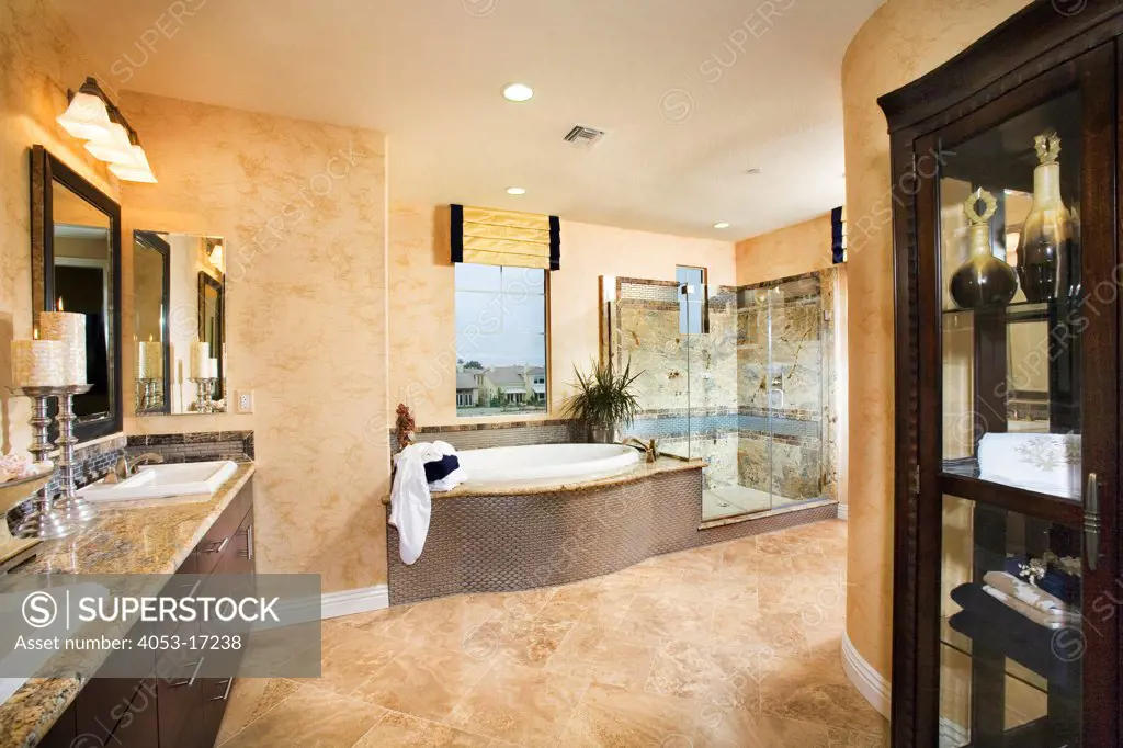Interior of master bathroom with glass shower and sink, Oxnard, California, USA. 07/28/2006