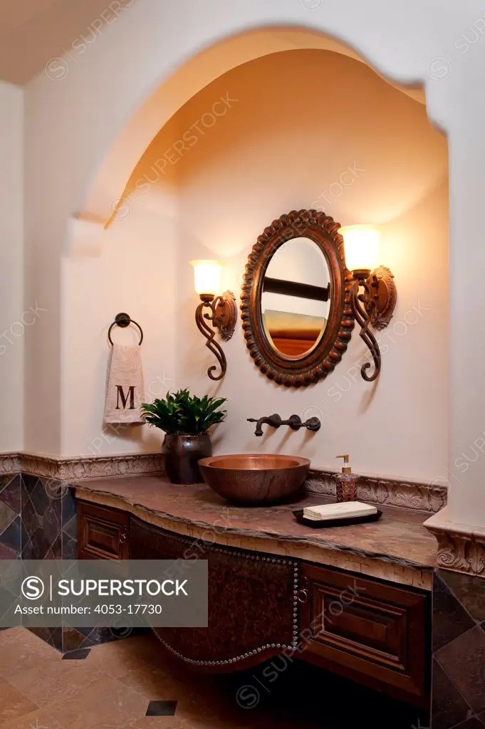 Traditional styled bathroom with wall sconces in hotel, Scottsdale, Arizona, USA, 8472 East Moonlight Pass. 01/25/2013