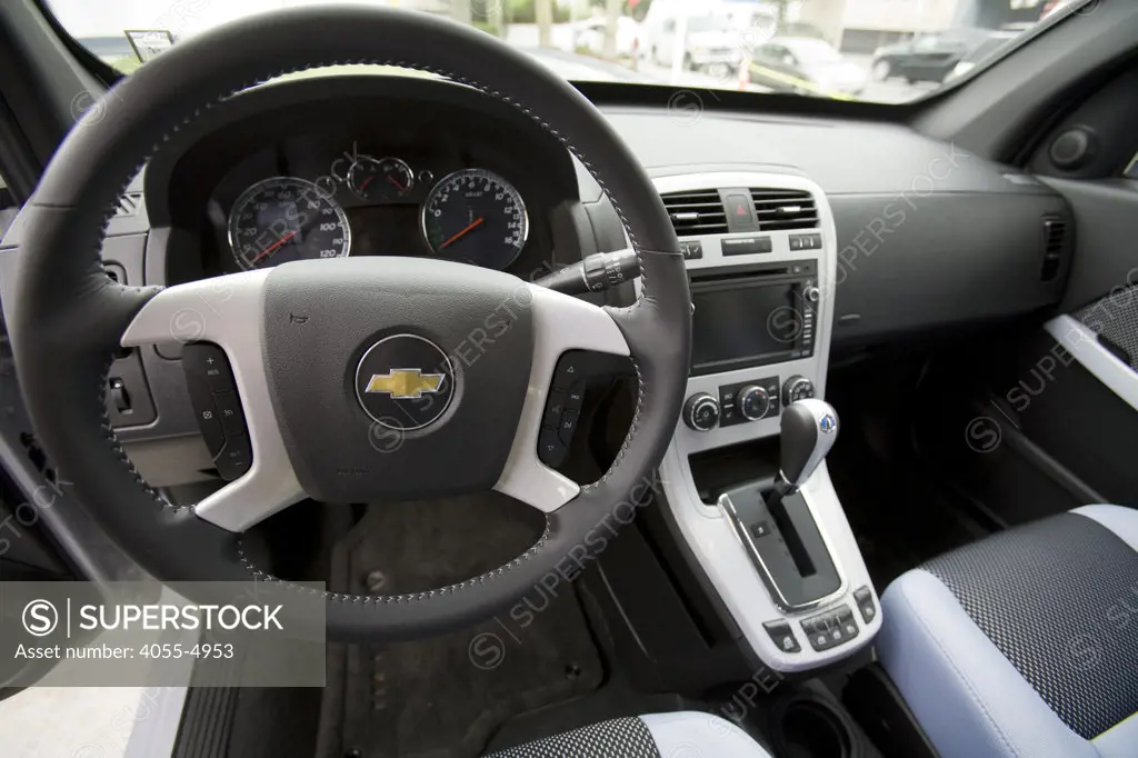 Interior of GM's Equinox SUV. On June 26, 2008, Shell opened California's first retail hydrogen car refueling station in West Los Angeles. In hydrogen vehicles, an electric motor powers the wheels. A chemical reaction inside a unit called a fuel  cell - usually between hydrogen and oxygen - creates electricity for the motor. Los Angeles, California, USA