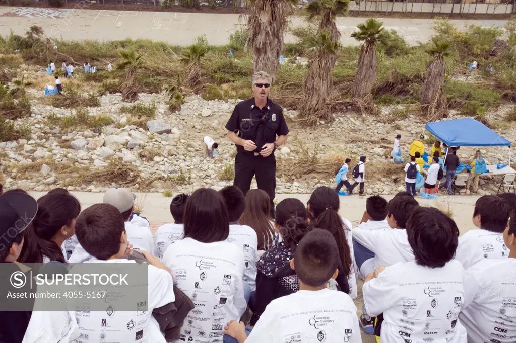 Capt. Robby Cordobes of the Swiftwater Rescue Team explains river safety to volunteers at FoLAR's River School Day of the LA River.
