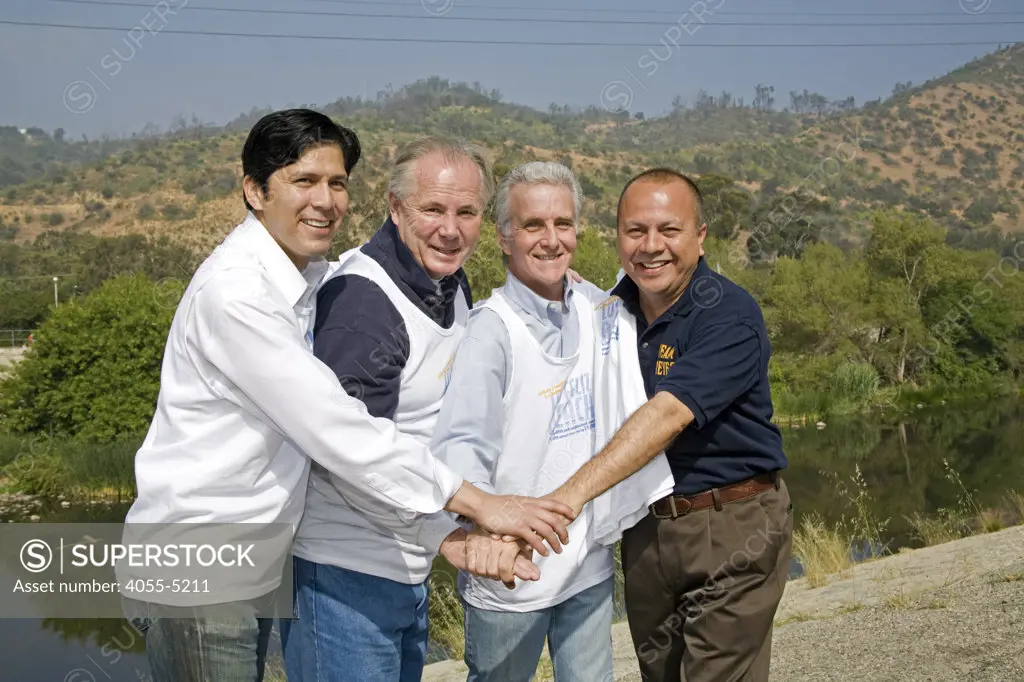 (Left to right) State Assemblyman Kevin De León, City Councilman Tom LaBonge, State Assemblyman Paul Krekorian and City Councilman Ed Reyes. FoLAR' (Friends of the LA River) annual river cleanup, La Gran Limpieza, was held  May 9, 2009. Thousands of volunteers at 14 sites pulled out accumlated trash, mostly plastic bags, from river runoff that might normally find it's way downstream into the Pacific Ocean.