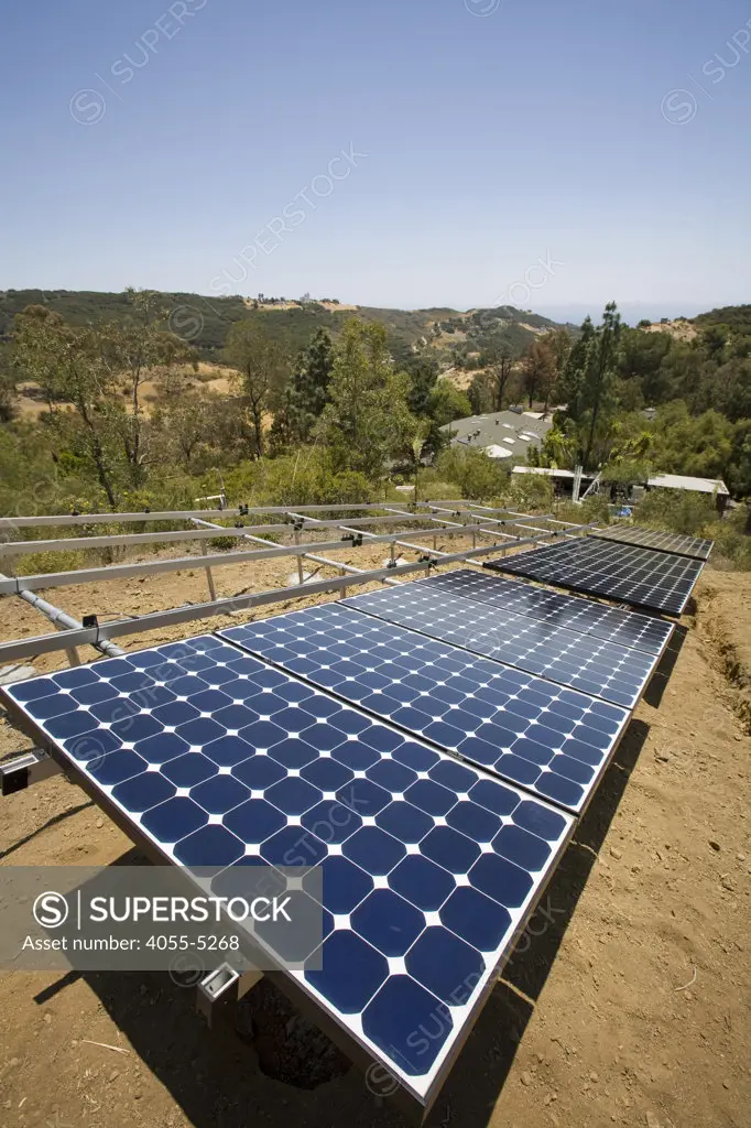 In progress installation of a residential grid-tied solar array on a hillside in Malibu, Installation by Martifer Solar USA, California, USA