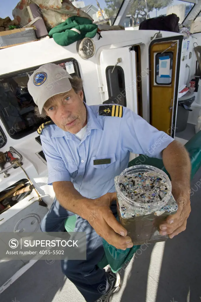 Captain Charles Moore, the man credited for first discovering the plastic soup in the Gyre over 10 years ago, showing plastic samples collected in the North Pacific Gyre.