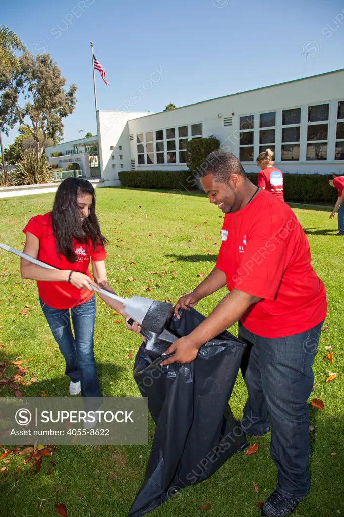 Keller Williams volunteers help clean up at John Adams Middle School in Santa Monica. More than 30,000 associates from  Keller Williams Realty across the United States and Canada participate in the third annual RED Day, May 12, 2011.