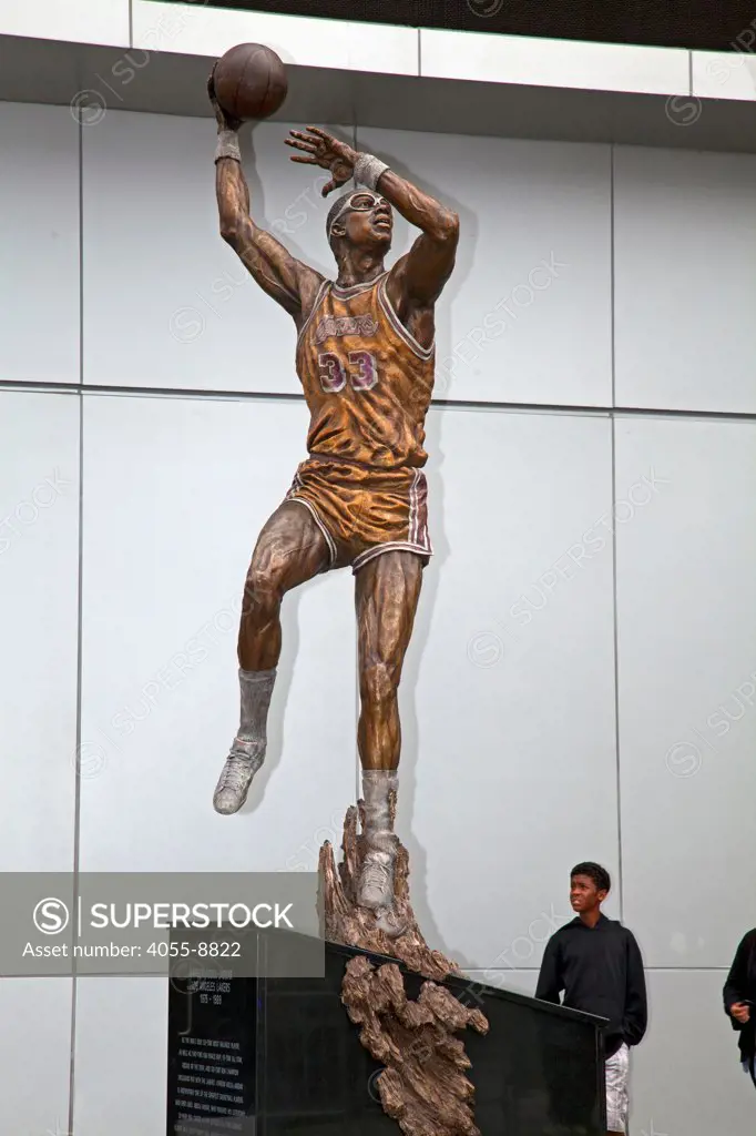 A nearly 16 foot statue captured in bronze, of Kareem Abdul-Jabbar was unveiled On November 16, in front of Staples Center, joining statues of other Laker legends Earvin ""Magic"" Johnson and broadcaster Chic Hearn. Jabbar is posed in his trademark skyhook shot. Los Angeles, California, USA