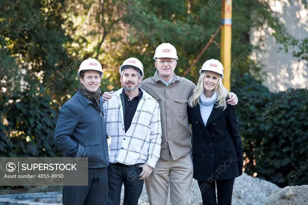 (l-r) Raphael Sbarge, executive producer of ""On Begley Street"",  general contractor  Scott Harris, Ed Begley Jr. and Rachelle Carson-Begley. Steel framing began on 1/14/2013 over the foundation on the Begley's new home. Studio City, California, USA