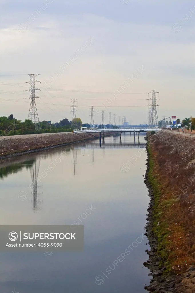 Dominguez Channel, a 15.7 mile stream that drains the Dominguez Watershed, going from its headwaters in Hawthorne and it emptying into the East Basin of the Port of Los Angeles. Carson, California, USA
