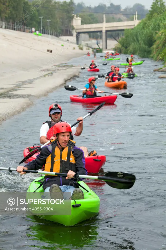 Kayakers stretched out along the LA River. On June 1, 2013, George Wolfe and LA River Expeditions leads a kayak tour down the Los Angeles River. On Memorial Day, the Los Angeles River Pilot Recreational Zone officially opened to the public for kayaking, walking, birdwatching, and fishing along a 2.5 mile stretch of the river in the Elysian Valley. Los Angeles, California