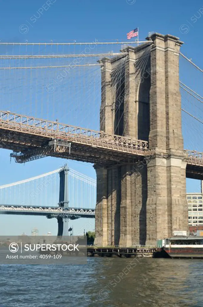 Low angle view of suspension bridges, Brooklyn Bridge and Manhattan Bridge, Manhattan, New York City, New York State, USA