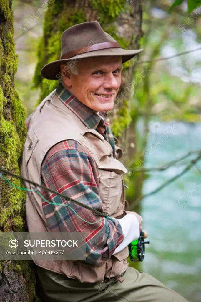USA, Washington, Vancouver, Portrait of smiling senior fisherman