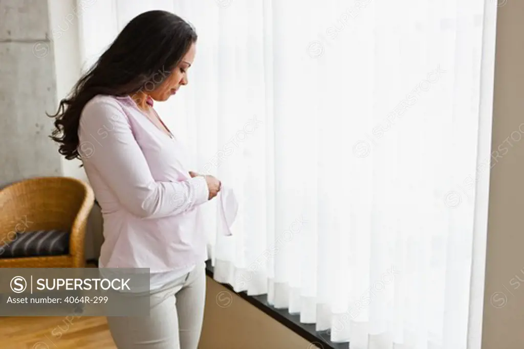 Woman getting dressed in morning