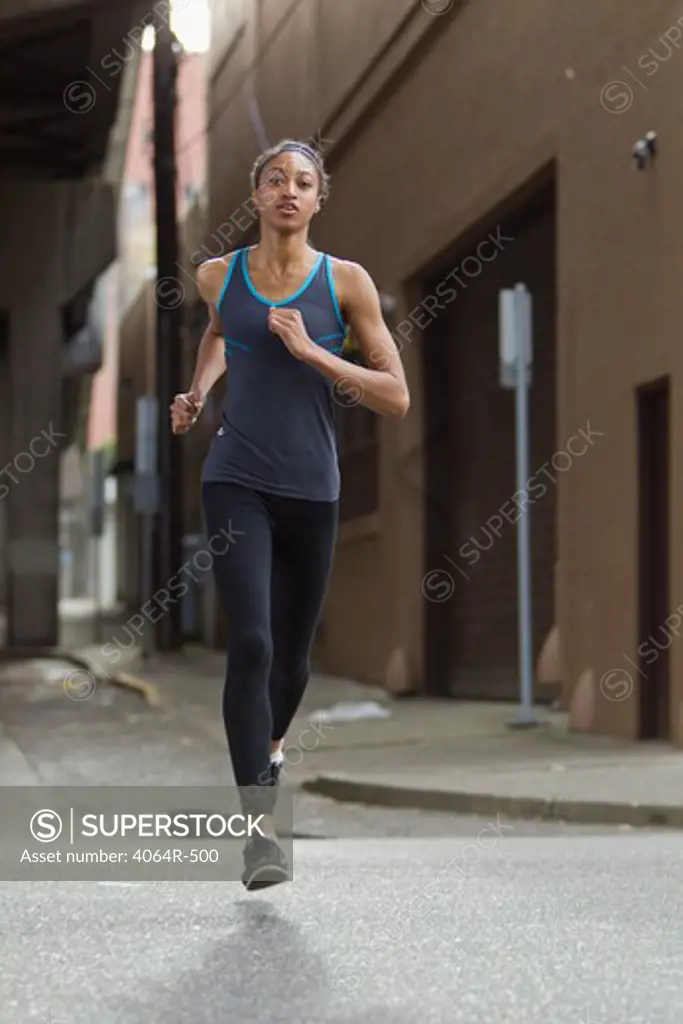 Woman jogging in street