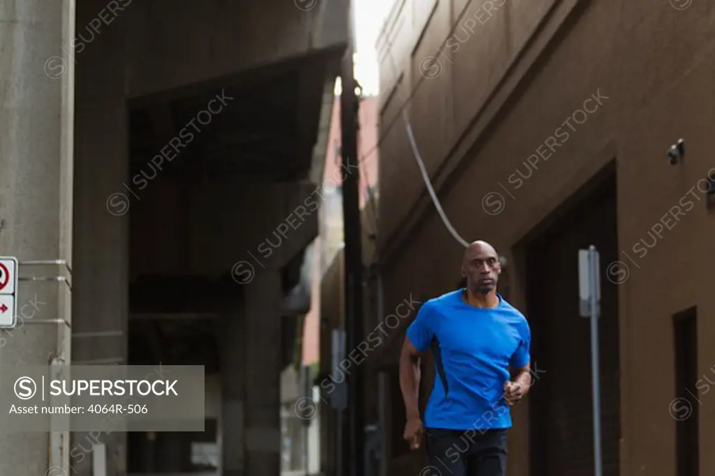 Man jogging in street