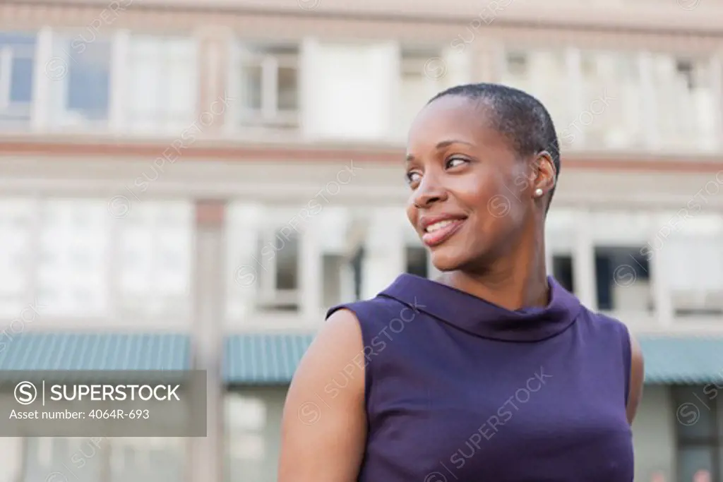Outdoor portrait of smiling businesswoman