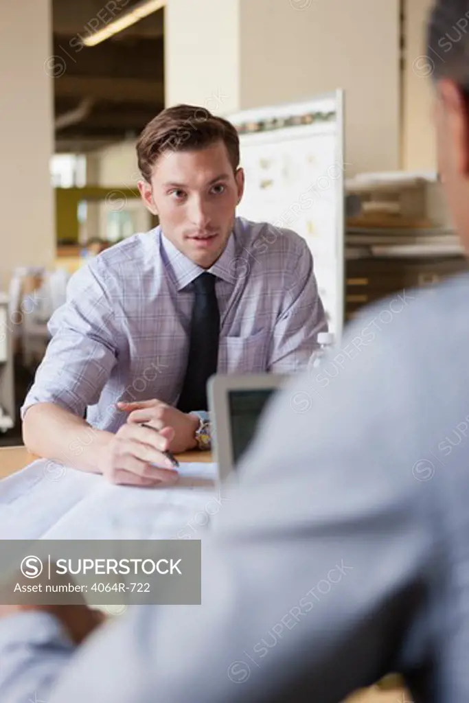 Businessman working on project at office