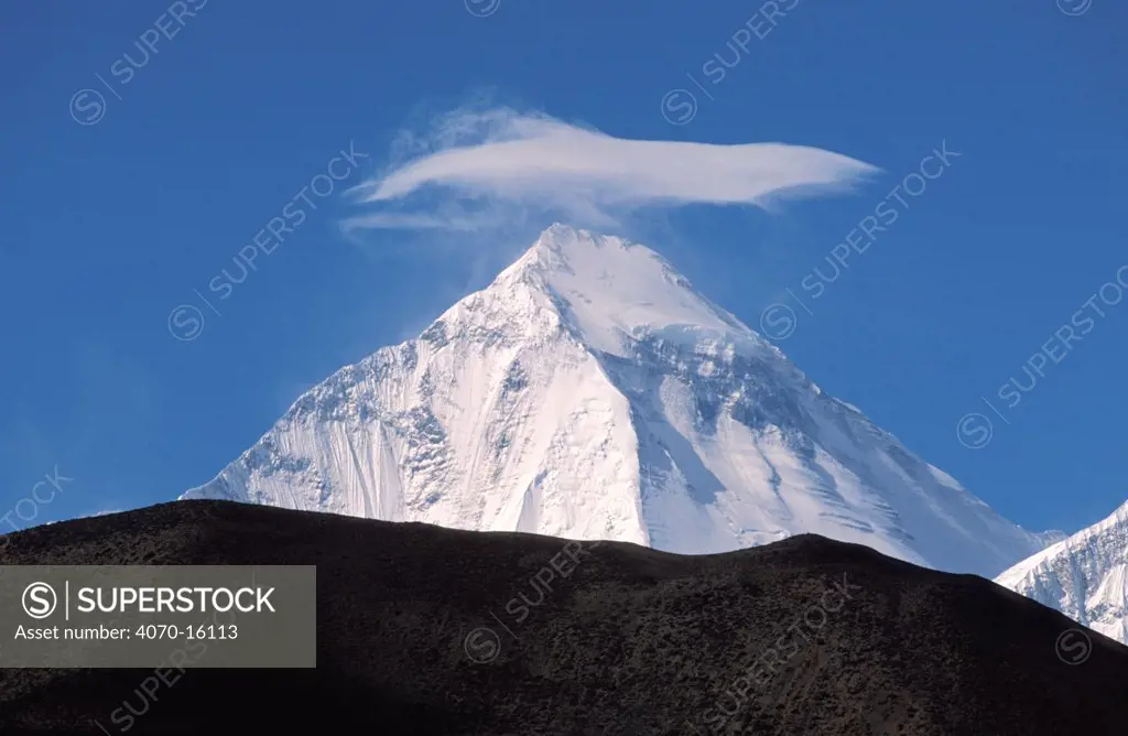 Dhaulagiri mountain peak with cloud, from Muktinath, Lower Mustang, Nepal. November 2004