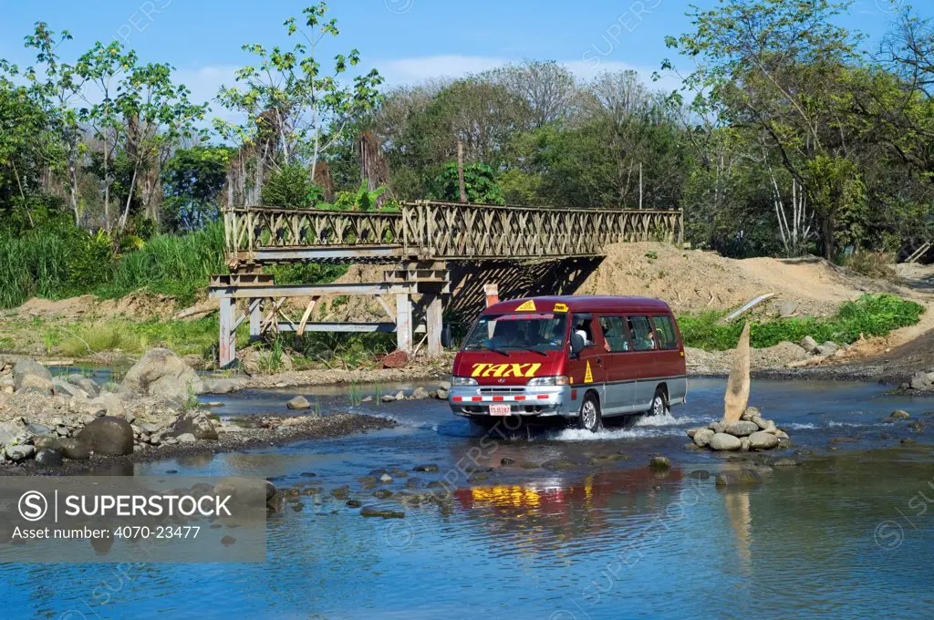 Taxi crossing river in Costa Rica