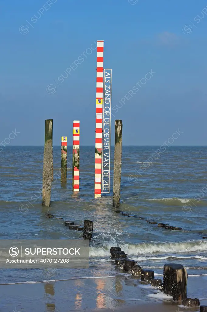 Sea tide depth measure / water level gauge on beach at low tide. Zeeland, the Netherlands January 2011.