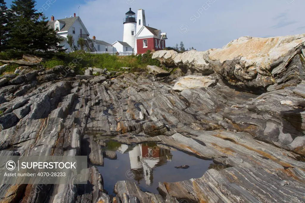 Pemaquid Lighthouse reflecting in tidal pool; Pemaquid, Maine, USA, July 2012