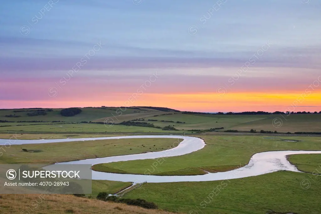 The Cuckmere River at sunset, Seven Sisters Country Park, South Downs National Park, East Sussex, England, UK, July 2011