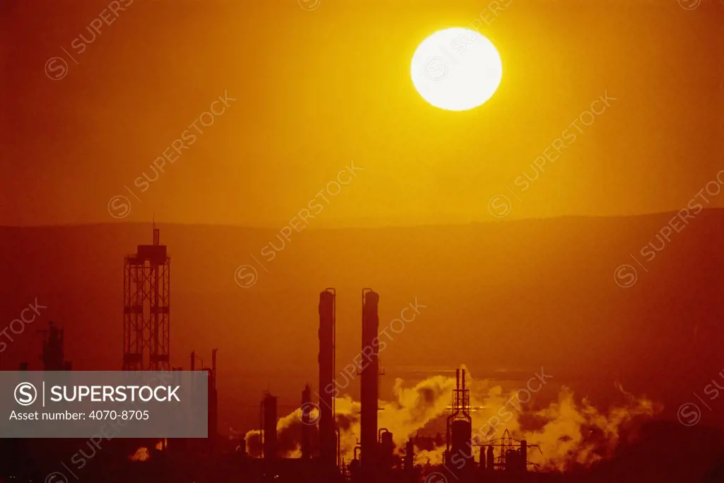 Industrial air Pollution at sunset, Avonmouth, near Bristol, UK
