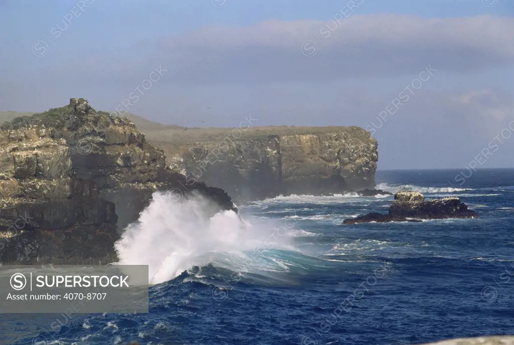 Wave crashing against Cliff face, Espanola / Hood Is. Galapagos Islands, 2005