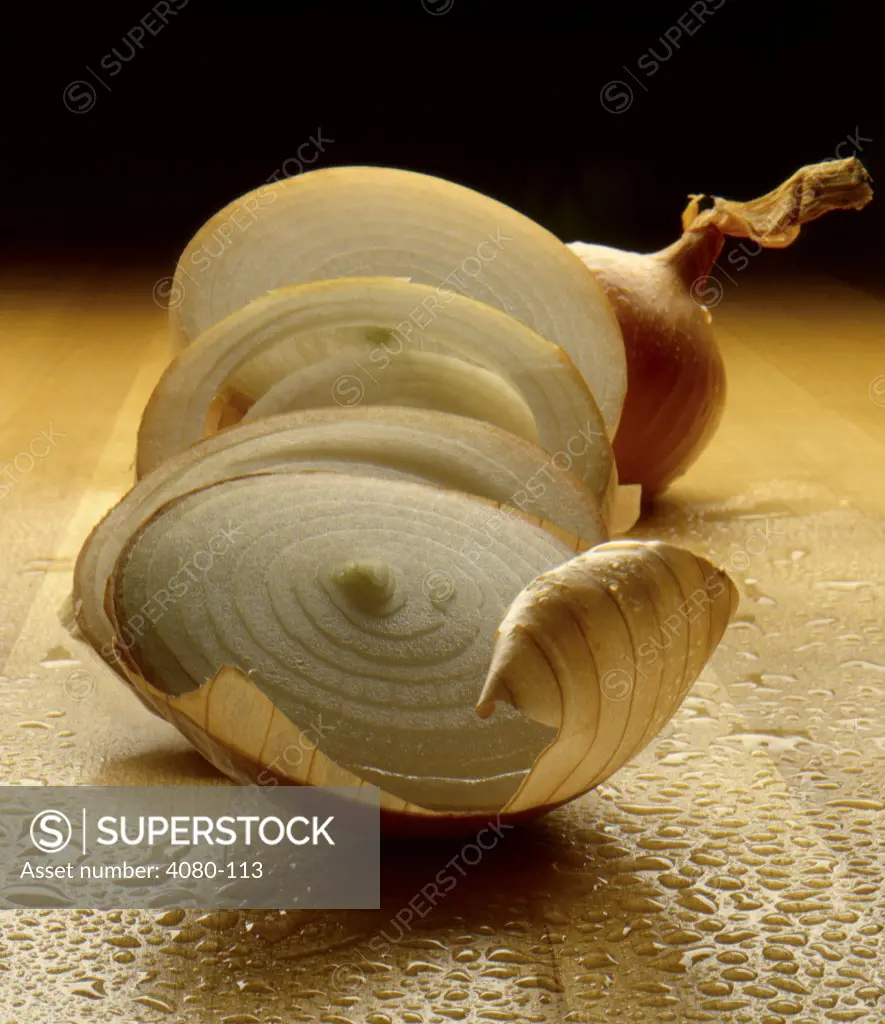 Close-up of sliced onion on butcher block