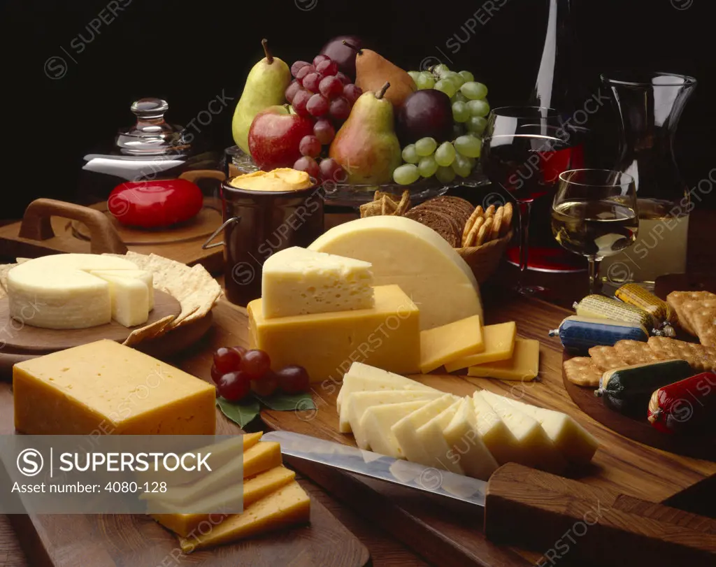 Assorted cheese with fruits and wines