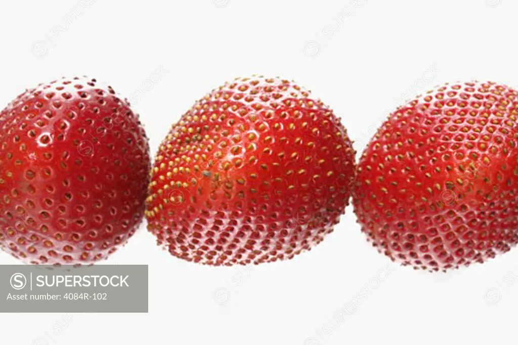 Three Strawberries on White