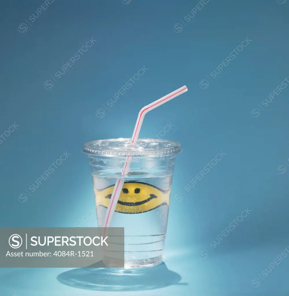 Cup of Water With Happy Face and Straw