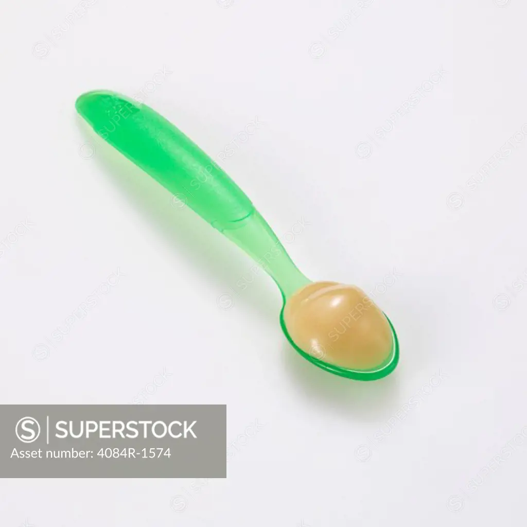 Green Plastic Spoon With Baby Food