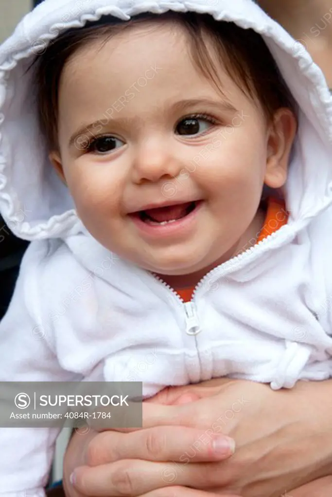 Smiling Young Girl With Hooded Sweatshirt, Close-Up