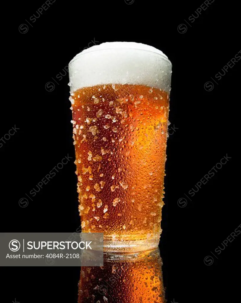 Glass of Beer With Condensation and Ice