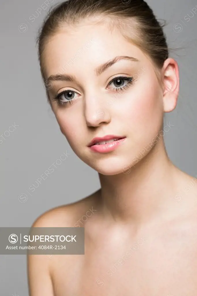 Teenage Girl With Blonde Hair Pulled Back, Portrait,