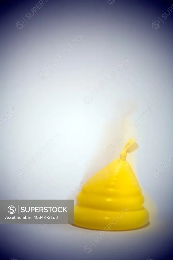 Yellow Balloon Filled With Water Being Dropped