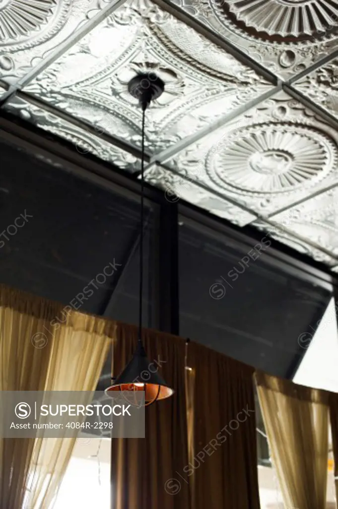 Tin Ceiling and Hanging Light Fixture, Low Angle View