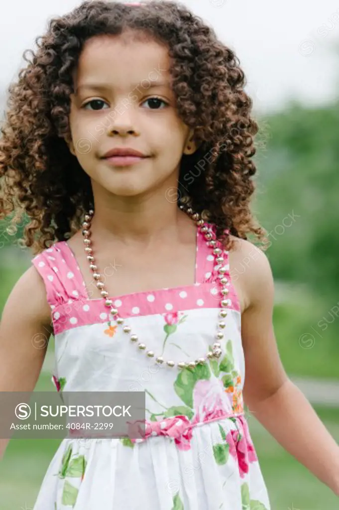 Young Girl With Curly Brown Hair, Portrait