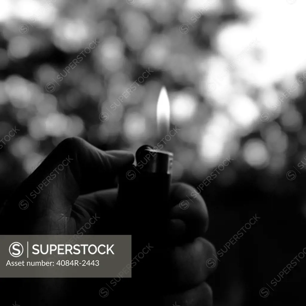 Hand with Lit Lighter