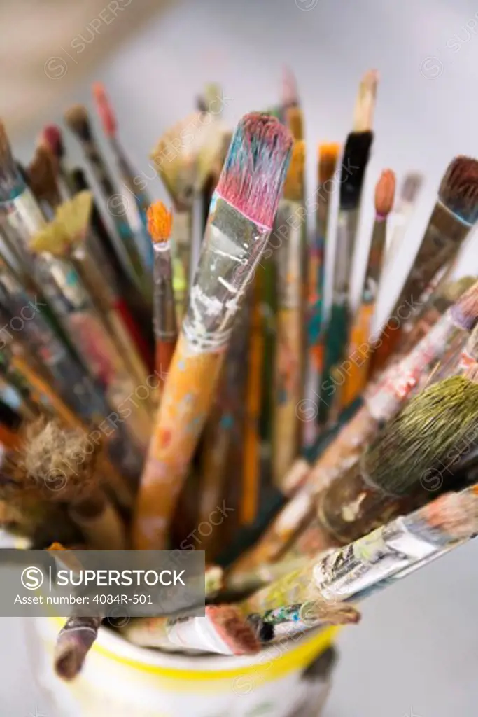 Used Paintbrushes in a Can