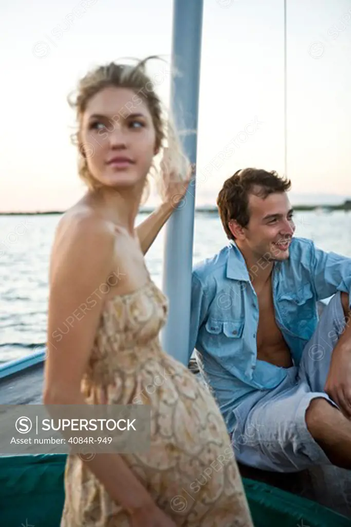 Young Couple Relaxing on Boat