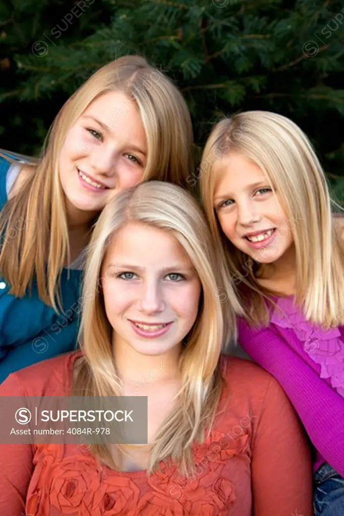Three Smiling Blonde Girls