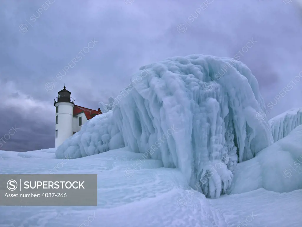 Lighthouse at the lakeside in winter, Point Betsie Lighthouse, Lake Michigan, Frankfort, Benzie County, Michigan, USA