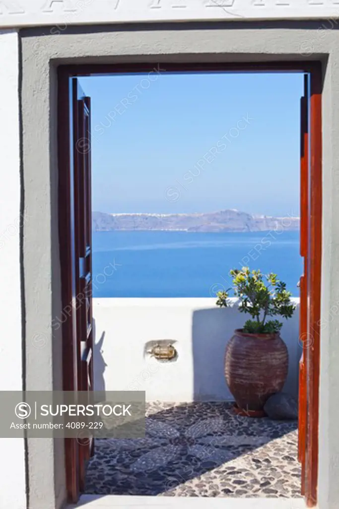 Sea viewed through doorway, Oia, Santorini, Cyclades Islands, Greece