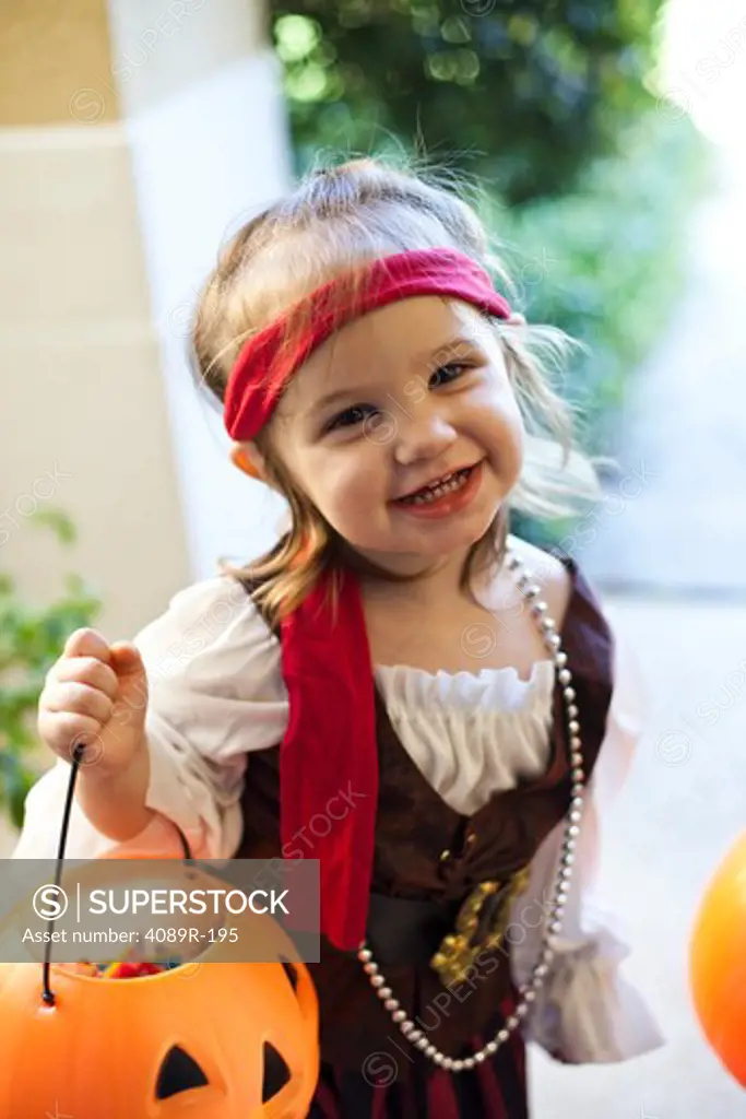 Girl playing Trick Or Treat